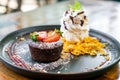chocolate cake lava with strawberry and vanilla ice-cream Royalty Free Stock Photo