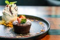 chocolate cake lava with strawberry and vanilla ice-cream Royalty Free Stock Photo