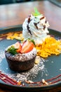 chocolate cake lava with strawberry and vanilla ice-cream Royalty Free Stock Photo