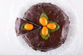 Chocolate cake on white wooden table