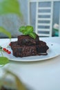 Chocolate cake on a plate. chocolate brownie cake