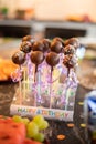 chocolate cake pops on the festive table and the inscription happy birthday Royalty Free Stock Photo