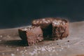 Chocolate cake with raspberry on a wooden background Royalty Free Stock Photo