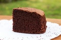 Chocolate cake on white Doyley Paper. Royalty Free Stock Photo
