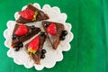 chocolate cake with whole strawberries on top Royalty Free Stock Photo