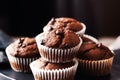 Chocolate cakes, muffins or cupcakes, baked in a bakery holiday sweet food recipe idea, generative ai