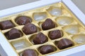 Chocolate candies in incomplete box