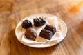 Chocolate candies on a saucer in a cafe