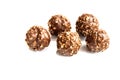 Chocolate truffle with nut crumbs on an isolated white background. Delicious sweet treat. Royalty Free Stock Photo