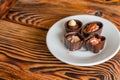 Chocolate candies on a white saucer Royalty Free Stock Photo