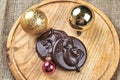 Chocolate candy medal with the image of a bull in the New Year`s theme Royalty Free Stock Photo