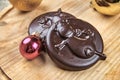 Chocolate candy medal with the image of a bull in the New Year`s theme Royalty Free Stock Photo