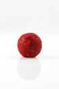 Chocolate candy truffle red color isolated on a white background. Full depth of field. Close-up Royalty Free Stock Photo