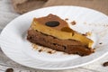 Chocolate Caramel Flan Slice on Rustic Plate Royalty Free Stock Photo