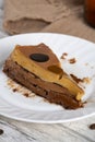 Chocolate Caramel Flan Slice on Rustic Plate Royalty Free Stock Photo