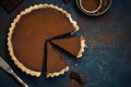 Chocolate and caramel tart on dark blue background Royalty Free Stock Photo