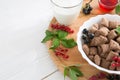 chocolate cereal pads with berries in bowl Healthy tasty breakfast chocolate square pads with strawberries, raspberries Royalty Free Stock Photo