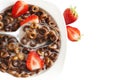 Chocolate cereals and strawberries for breakfast closeup. Royalty Free Stock Photo