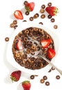 Chocolate cereals and strawberries for breakfast Royalty Free Stock Photo
