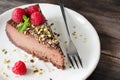 Chocolate cheesecake decorated with raspberries and mint Royalty Free Stock Photo