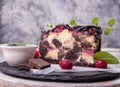 Chocolate cherry fruit cake. Piece of sweet pie and frosen cherry on white background Royalty Free Stock Photo