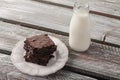 Chocolate Chip Brownie on wheathered wood table Royalty Free Stock Photo