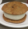 Chocolate chip cookie ice-cream sandwich with vanilla ice cream center Royalty Free Stock Photo