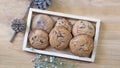 Chocolate chip cookies with almonds on a wooden tray. Top view Royalty Free Stock Photo