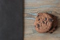 Chocolate cookies on wooden table. Royalty Free Stock Photo