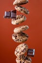 Chocolate chip cookies falling in stack Royalty Free Stock Photo