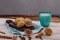 Chocolate chip cookies and glass of milk in background. baking nuts with chocolate and cinnamon Royalty Free Stock Photo