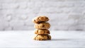 Chocolate chip cookies and a glass of milk on a white background