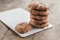 chocolate chip cookies, meringue with cracks on a rustic background Royalty Free Stock Photo