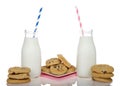 Chocolate Chip Cookies and Milk pink and blue straws Royalty Free Stock Photo