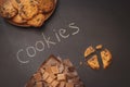 Chocolate chip cookies over dark background Royalty Free Stock Photo