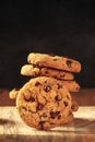 Chocolate chip cookies stack on a dark rustic wooden background Royalty Free Stock Photo