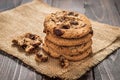 Chocolate chip cookies with wooden background Royalty Free Stock Photo