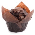 Chocolate chip muffin in brown wax paper Royalty Free Stock Photo
