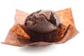 Chocolate chip muffin in brown wax paper. Unwrapped Royalty Free Stock Photo