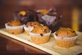 Chocolate chip muffins on cutting board Royalty Free Stock Photo