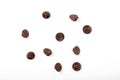 Chocolate chips scattered on white background Royalty Free Stock Photo