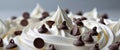 Chocolate chips on whipped cream frosting Royalty Free Stock Photo