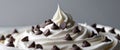 Chocolate chips on whipped cream frosting. Royalty Free Stock Photo