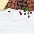 Chocolate chocolates bar food sweets copyspace square wooden boa Royalty Free Stock Photo