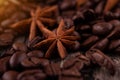 Chocolate, cinnamon sticks  and coffee beans on wooden background Royalty Free Stock Photo