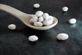 Chocolate coated Almonds on big Spoon Royalty Free Stock Photo