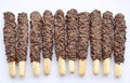Chocolate coated biscuit sticks on white background Royalty Free Stock Photo