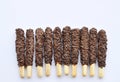 Chocolate coated bread sticks on white background Royalty Free Stock Photo