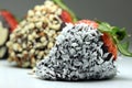 Chocolate coated strawberry with coconut