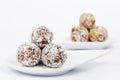 Chocolate and coconut balls on a white plate Royalty Free Stock Photo